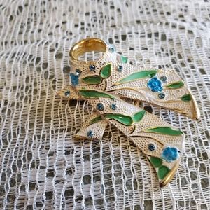 Vintage 1950s B.S.K. Gold Tone Blue Rhinestone Flower Sash Brooch